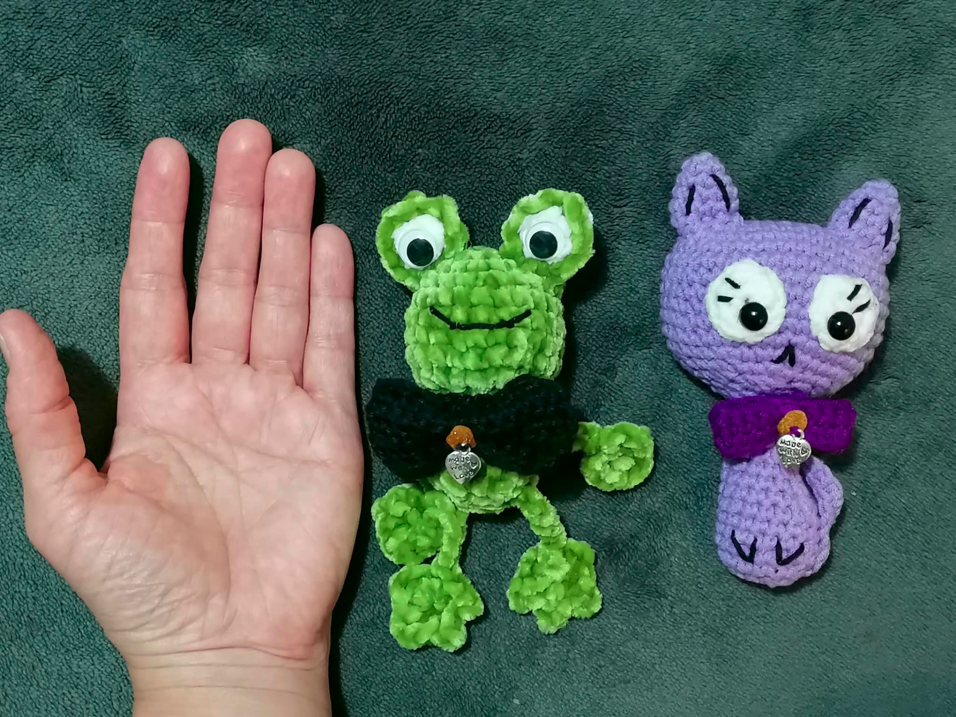 Several small handmade crocheted characters together